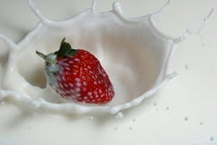 Strawberry In Milk Stock Images
