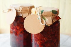Strawberry jam with a blank label stock images Strawberry jam with a blank label stock images