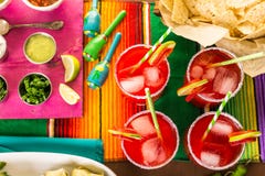 Strawberry margaritas. Strawberry and lime margaritas on the party table Strawberry margaritas. Strawberry and lime margaritas on the party table