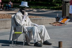 Street artist dressed in white royalty free stock photography Street artist dressed in white royalty free stock photography