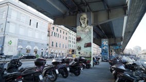 Street drawings in modern city. Action. Beautiful street illustrations on columns of city highway. Street art on columns