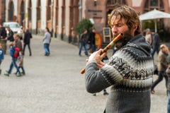Street Musician Playing Flute