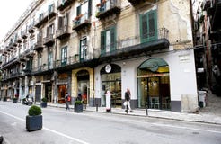 Street with very old apartment buildings and shops in Palermo royalty free stock images Street with very old apartment buildings and shops in Palermo royalty free stock images