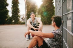 Streetball players taking break after a game royalty free stock images Streetball players taking break after a game royalty free stock images