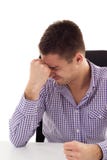 Stressed at work. Angry young man Stock Photos Stressed at work. Angry young man Stock Photos