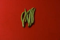 String beans fresh vegetables on isolated red background royalty free stock images String beans fresh vegetables on isolated red background royalty free stock images