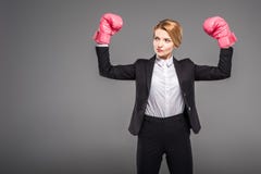 strong businesswoman posing in boxing gloves, stock image strong businesswoman posing in boxing gloves, stock image