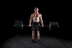 Strong Man Deadlifts A Lot Of Weight Royalty Free Stock Photography Strong Man Deadlifts A Lot Of Weight Royalty Free Stock Photography