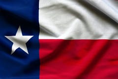 Struttura di Texas Flag - bandiere del tessuto da U.S.A. fotografia stock Struttura di Texas Flag - bandiere del tessuto da U.S.A. fotografia stock