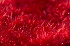 Struttura sfocata rossa del tessuto fotografie stock Struttura sfocata rossa del tessuto fotografie stock
