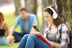 Student learning listening on line tutorials Stock Images Student learning listening on line tutorials Stock Images