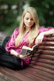 Student Reading Book In Summer Park. Royalty Free Stock Photo