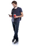 Student with smartphone cola drink young man full body portrait royalty free stock photography Student with smartphone cola drink young man full body portrait royalty free stock photography