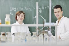 Students Couple In Lab Stock Images