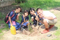 Students are growing the tree. stock photos Students are growing the tree. stock photos