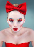 Studio beauty portrait of doll with red bow stock images Studio beauty portrait of doll with red bow stock images