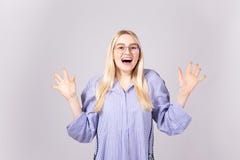 https://thumbs.dreamstime.com/t/studio-shot-gorgeous-young-blonde-straight-hair-woman-wearing-round-eyeglasses-blue-oversized-boyfriend-style-shirt-rolled-136494652.jpg