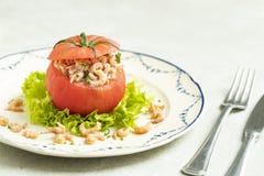 Stuffed Tomato with north sea shrimps served on a classic plate