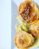 Stuffed Tortelli Ravioli Pasta dusted with grated cheese and olive oil royalty free stock photography Stuffed Tortelli Ravioli Pasta dusted with grated cheese and olive oil royalty free stock photography