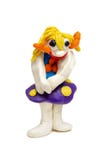 Stuk speelgoed ambacht van plasticine plasticine grappig meisje met geel haar en blauwe rok royalty-vrije stock foto's Stuk speelgoed ambacht van plasticine plasticine grappig meisje met geel haar en blauwe rok royalty-vrije stock foto's