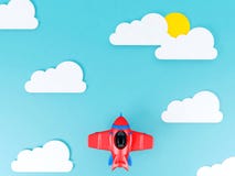 Stuk speelgoed vliegtuig die boven van de wolkenhemel vlak ontwerp als achtergrond vliegen royalty-vrije illustratie Stuk speelgoed vliegtuig die boven van de wolkenhemel vlak ontwerp als achtergrond vliegen royalty-vrije illustratie
