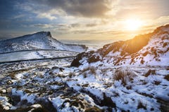 Stunning Winter sunset over countryside landscape with dramatic stock image Stunning Winter sunset over countryside landscape with dramatic stock image