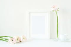 Styled mockup with white frame and pink ranunculos