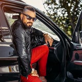 Stylish beard handsome man in a car - outdoor fashion portrait Royalty Free Stock Photo Stylish beard handsome man in a car - outdoor fashion portrait Royalty Free Stock Photo