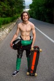 Stående av en yrkesmässig longboarder royaltyfria bilder Stående av en yrkesmässig longboarder royaltyfria bilder