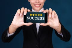 Success concept, Happy businesswoman Show text Success on smart phone royalty free stock photos Success concept, Happy businesswoman Show text Success on smart phone royalty free stock photos