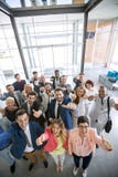 Success smiling business group giving thumbs up Stock Images Success smiling business group giving thumbs up Stock Images