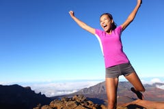Success winner fitness runner woman jumping stock photo Success winner fitness runner woman jumping stock photo