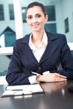 Successful business woman in her office stock image Successful business woman in her office stock image