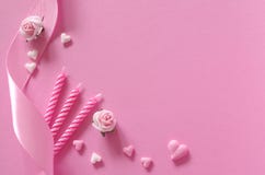 Sugar hearts, roses, candles and gift ribbon of pink backround Royalty Free Stock Images Sugar hearts, roses, candles and gift ribbon of pink backround Royalty Free Stock Images