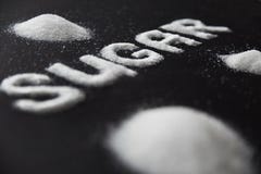 Sugar Word Sugar On Background branco imagens de stock royalty free Sugar Word Sugar On Background branco imagens de stock royalty free