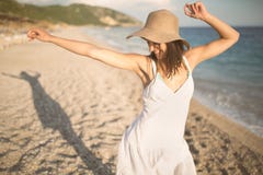 Summer beach fashion woman enjoying summer and sun.Concept of summer feeling,happiness stock image Summer beach fashion woman enjoying summer and sun.Concept of summer feeling,happiness stock image