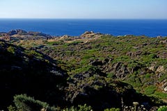 Summer: a cove cliff of cape of the Crosses in Spain with blue sea stock image Summer: a cove cliff of cape of the Crosses in Spain with blue sea stock image