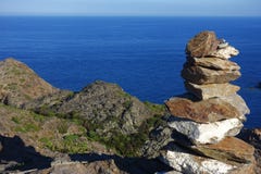 Summer: a cove cliff of cape of the Crosses in Spain with blue sea stock photo Summer: a cove cliff of cape of the Crosses in Spain with blue sea stock photo