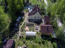 Summer house, barns, sauna, greenhouses in garden on small land of country, Russia Royalty Free Stock Photography Summer house, barns, sauna, greenhouses in garden on small land of country, Russia Royalty Free Stock Photography