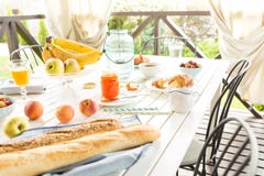 Summer outdoor continental breakfast on the garden terrace Stock Images Summer outdoor continental breakfast on the garden terrace Stock Images