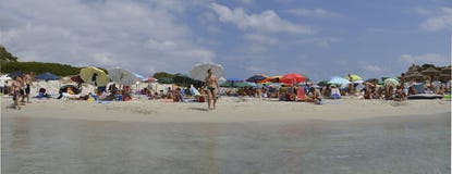 Bathers at the sea at summer paradise in the magnificent island of Sardinia stock photos Bathers at the sea at summer paradise in the magnificent island of Sardinia stock photos