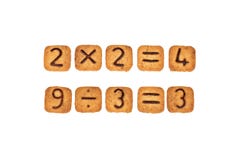 Sums Made Of Square Cookies With Chocolate Numerals On Them. Isolated On White Background. Royalty Free Stock Image Sums Made Of Square Cookies With Chocolate Numerals On Them. Isolated On White Background. Royalty Free Stock Image