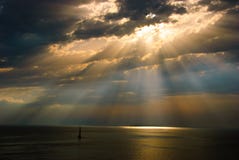 Sun Beams Through The Clouds On The Sea Royalty Free Stock Images