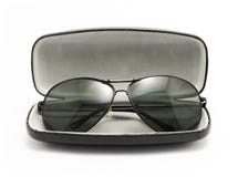 Sunglasses in black opened case. On white background Royalty Free Stock Photos Sunglasses in black opened case. On white background Royalty Free Stock Photos