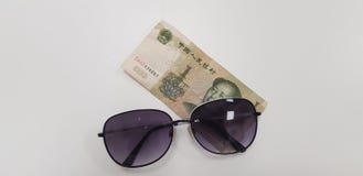One yuan banknote on white table stock images One yuan banknote on white table stock images