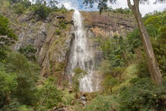 Sunny Day In The Tropical Waterfall Falls From The Mountain Cliff To The Jungle, Serene Landscape Of Diyaluma Falls. Stock Images