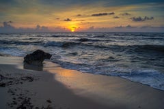 Sunrise over ocean with breaking waves stock photography Sunrise over ocean with breaking waves stock photography