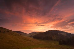 Sunrise after rain on a mountain pasture in Romania. stock images Sunrise after rain on a mountain pasture in Romania. stock images