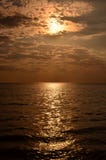 Sunset Above The Sea.Gold Sunset, Sea And Clouds. Beautiful Golden Orange Sunset Over The Ocean. Royalty Free Stock Photography Sunset Above The Sea.Gold Sunset, Sea And Clouds. Beautiful Golden Orange Sunset Over The Ocean. Royalty Free Stock Photography
