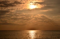 Sunset Above The Sea.Gold Sunset, Sea And Clouds. Beautiful Golden Orange Sunset Over The Ocean. Royalty Free Stock Photography